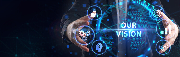 Business, Technology, Internet and network concept. Young businessman working on a virtual screen of the future and sees the inscription: Our vision © photon_photo