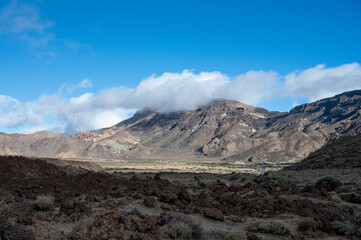 Visiting Teide national park on Tenerife and view on volcanic landscapes, Canary islands, Spain