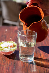 Dinner at guachinche, typical Canary Island establishment on Tenerife, where locally produced white or red wine served accompanied by homemade traditional food.