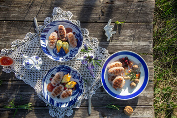 Breakfast in nature. Dishes in blue tones. Rice dumplings. Gluten free.