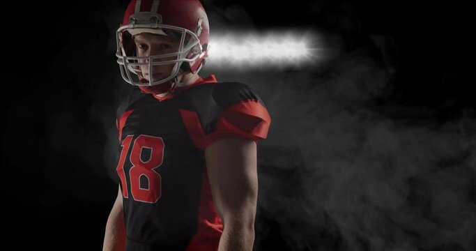 Animation of american football player over clouds of smoke and spotlights in background