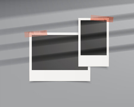 realistic photo frame polaroid paper potrait and landscape with tape againts grey wall