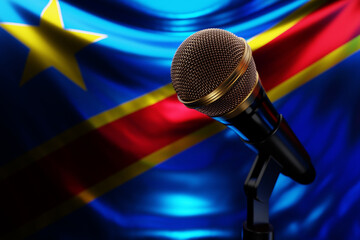 Microphone on the background of the National Flag of Democratic Republic of the Congo, realistic 3d...