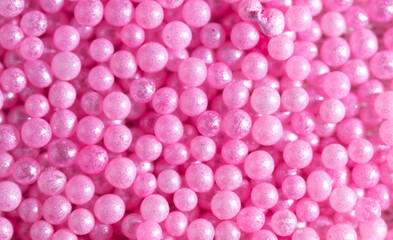 Small sweet pink balloons as a background.