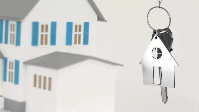 Animation of keys and house model over white background