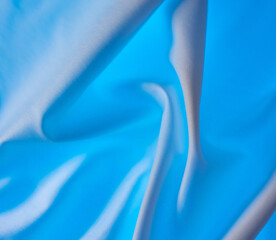 Blue fabric material as an abstract background.