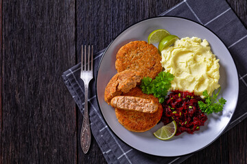 salmon patty with potato mash and beetroot salad