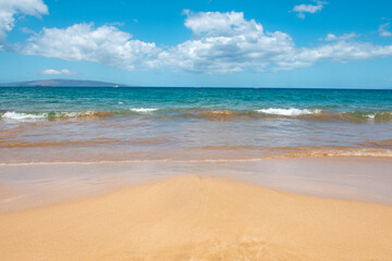 Calm sea beach background. Summer tropical beach with sand. Ocean water. Natural seascape.