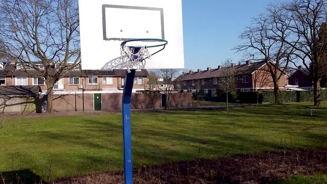 Outside basketball hoop in a neighbourhood