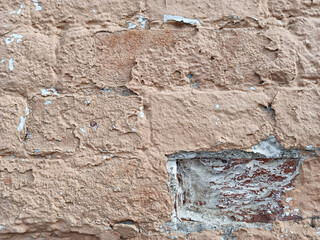 Abstract brick background with cracked old paint