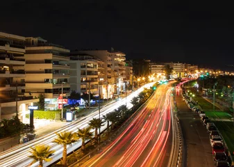 Gardinen Cityscape, top view of the night Athens with illuminated strees and headlights, Greece © Polina
