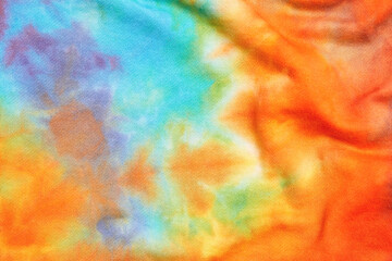 Abstract tie dye multicolor folded fabric cloth Boho pattern texture for background or groovy wedding card, sale flyer, 60s, 70s poster, tie-dye diy backdrop. Modern Watercolor Wet Brush Fabrics Art