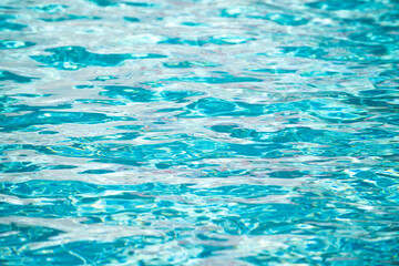 Water in swimming pool, background with high resolution. Wave abstract or rippled water texture.