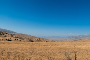 Picturesque Armenian autumn landscape in the backgrounds. Fields and meadows in the mountains of Armenia region. Stock photography