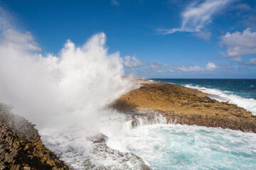 Wave crashing into Boka Pistol bay, Curaçao