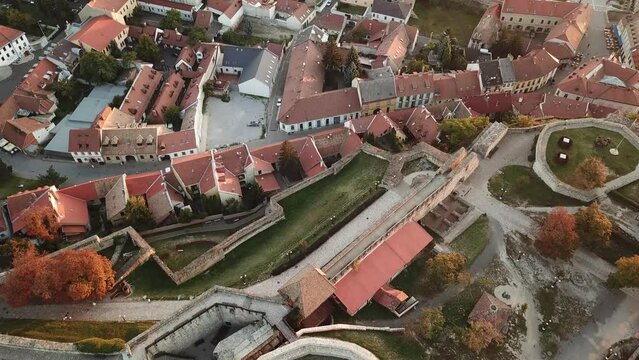 Cinematic 4K aerial drone bird's-eye footage of the medieval fortress and castle of Eger, a major tourist destination in Northern Hungary's Heves county