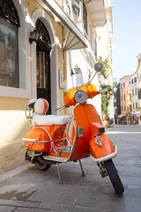 Zelfklevend Fotobehang scooter at the empty street © Sergii Mostovyi