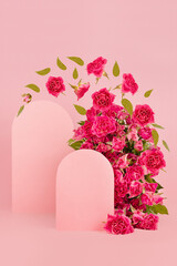 Fresh pink roses as arch, two empty rounded doors as podiums with green leaves, buds soar as frame on abstract pink scene mockup for presentation cosmetic, goods, advertising, design, vertical.