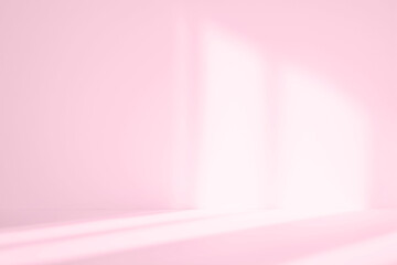 Abstract pink studio background for product presentation. Empty room with shadows of window....