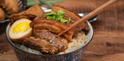Braised pork belly over cooked rice, famous and delicious street food in Taiwan.