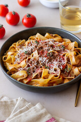 Pasta tagliatelle with bolognese sauce. Italian cuisine. Traditional recipe.