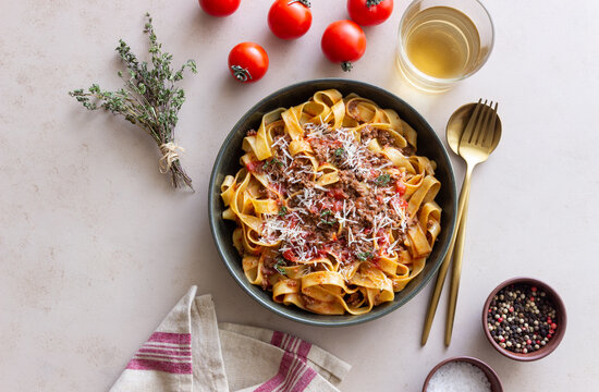 Pasta tagliatelle with bolognese sauce. Italian cuisine. Traditional recipe.