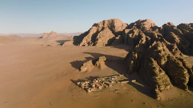 Ruins Of A Fort In The Middle Of The Desert Of Wadi Rum, Jordan - aerial drone shot