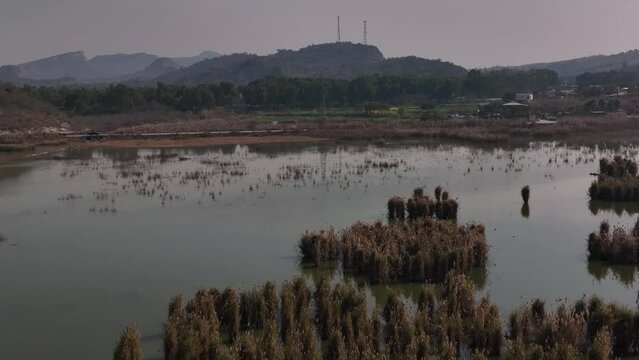 Aerial Flying Over Wetlands At Kallar Kahar At Chakwal District in Punjab. Dolly Forward, Establishing Shot