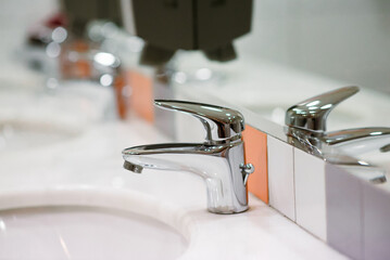 Close up old Stainless steel Chrome tap bathroom and dust on the surface do not clean and sensor...