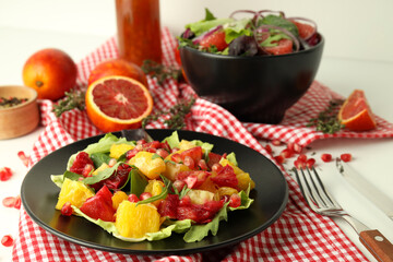 Concept of tasty food, salad with red orange, close up