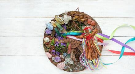 Wiccan altar for Beltane sabbath. spring pagan festive ritual. wheel of the year, witch doll,...