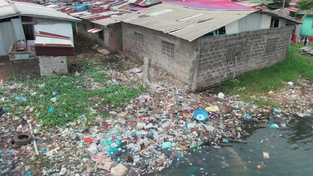 a lot of plastic waste on a beach in Monrovia