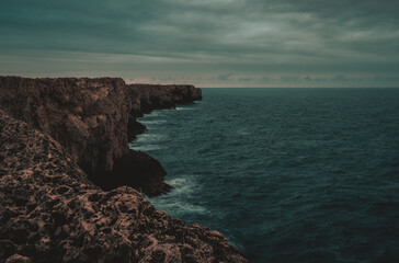 Fototapeta na wymiar high cliffs in the twilight