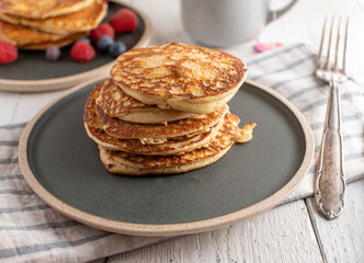 Plain protein pancakes on a plate made with eggs, oats and quark - obrazy, fototapety, plakaty