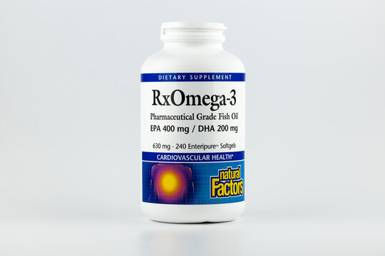 omega-3 softgel capsules in the jar. dietary supplement editorial photo
