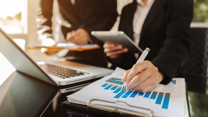 Business team meeting present.professional investor working with  Finance managers task. with laptop smart phone and digital tablet