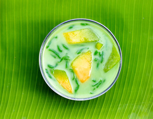 Rice flour pandan flavor with melon in coconut milk