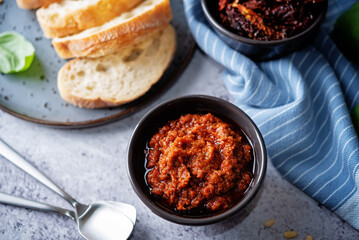 Dried tomatoes nuts pesto in a bowl