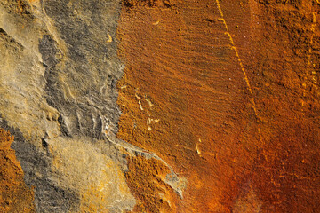 Warm orange color rock surface. Nature background for design purpose.