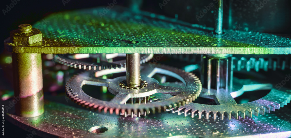 Aufkleber Close up Beautiful old gearsin neon light. Minimalism retro style concept.  Background pattern for design. Macro photography view.