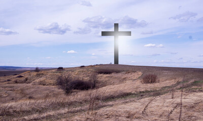 Cross of Jesus. Crucifix against the sky. Easter. Jesus has resurrected.	Love of God