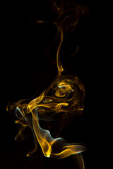 Colorful smoke on black background.