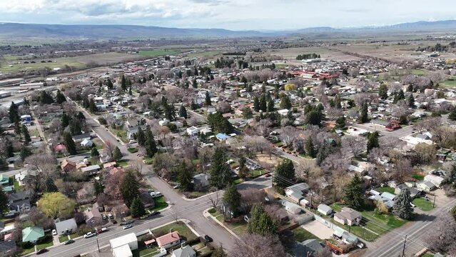 Cinematic 4K aerial drone pan shot of of the residential area of the city of Ellensburg, Kittitas County in Western Washington