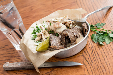 Slices of beef served with vegetables