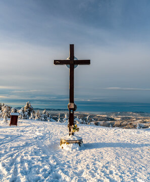 Cross on Velka Raca hill sumit in winter Kysucke Beskydy ountains on slovakian - polish borders