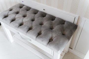 Fototapeta na wymiar white upholstered chair made of wood and fabric
