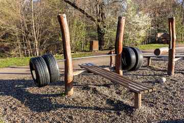 Outdoor gym in public park wooden barbbells