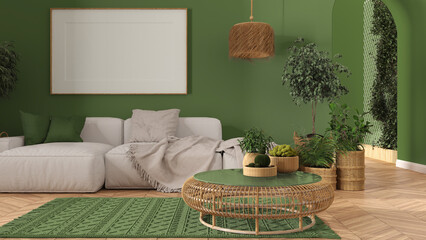 Scandinavian wooden living room in green tones with parquet and carpet, frame mockup, sofa with pillows, round rattan table, potted plants, pillows and decors. Modern interior design