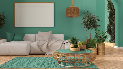 Scandinavian wooden living room in turquoise tones with parquet, carpet, frame mockup, sofa with pillows, round rattan table, potted plants, pillows and decors. Modern interior design
