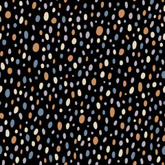 Hand drawn seamless pattern. Polka dot background. Brown and grey dots on black background. Trendy texture for print, textile. fabric, packaging.